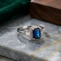 Royal Regent - Emerald-Cut Blue Sapphire Halo Ring
